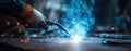 The welder creating sparks and blue flames in a dynamic industrial setting. AI generated image Royalty Free Stock Photo
