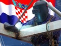 Welder of Croatia with his flag in the background Royalty Free Stock Photo