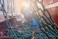 Welder doing welding on deck of ship lashing cargo Royalty Free Stock Photo