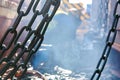 Welder doing welding on deck of ship lashing cargo