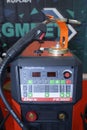 welder, electric semi automatic welding machine made by Megmeet, presented on stand. Control panel, holder