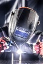 Welder industrial worker welding with argon machine Royalty Free Stock Photo