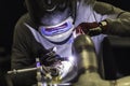 Welder industrial worker welding with argon machine Royalty Free Stock Photo