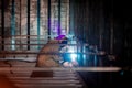 Welder makes welding inside an iron container Royalty Free Stock Photo