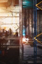 Welder makes welding inside an iron container Royalty Free Stock Photo