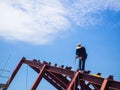 The Welder man a welding the steel roof.