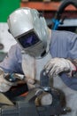 Welder in mask welding metal and sparks metal close Royalty Free Stock Photo
