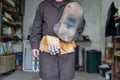 Welder in a mechanical workshop. An employee while working at th