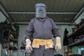 Welder in a mechanical workshop. An employee while working at th