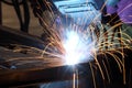 A welder in a metal fabrication facility. Royalty Free Stock Photo