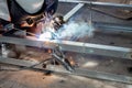 The welder in the operate,Employee welding U-steel using welder machine