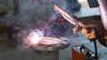 Welder performs welding work semi-automatic electric arc welding. MIG welding. Royalty Free Stock Photo