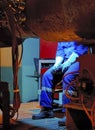 Welder resting during a break at work. Royalty Free Stock Photo