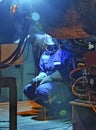 Welder resting during a break at work. Royalty Free Stock Photo