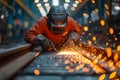 Welder in safety suit welding steel in a large factory Royalty Free Stock Photo