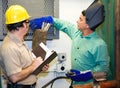 Welder with Supervisor Royalty Free Stock Photo