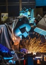 Welder, welding automotive part in a car factory