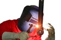 Welder is welding in factory