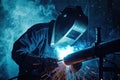 A welder welding a pipe Royalty Free Stock Photo