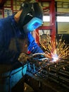 Welder welding rebar construction