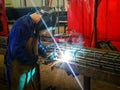 Welder welding rebar construction