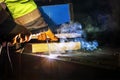 Welder is welding with shielded metal arc welding process to steel materials. Shielded metal arc (SMAW) Royalty Free Stock Photo