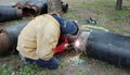 Welder Welding Two Big Pipes Royalty Free Stock Photo
