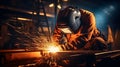 The welder is welding the various parts of the house.