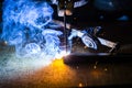 Professional welder man working on metal welding and sparks metal. Royalty Free Stock Photo