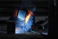 Welder at work with a welding mask Royalty Free Stock Photo