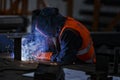 Welder at work with a welding mask Royalty Free Stock Photo