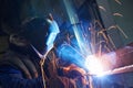 Welder worker at industrial arc welding work Royalty Free Stock Photo