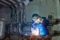 Welder worker at industrial arc welding work Royalty Free Stock Photo