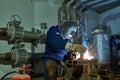 Welder worker at industrial arc welding work Royalty Free Stock Photo