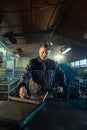 Welder working with autogenous welding tool in workshop Royalty Free Stock Photo