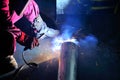 Welder working in factory