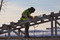 Welder working at height. Welding work on the construction. Iron construction Royalty Free Stock Photo