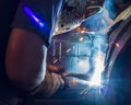 Welder works on a vehicle