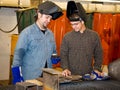 Welders Discussing the Job Royalty Free Stock Photo