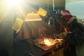 Welders working at the factory made metal Royalty Free Stock Photo