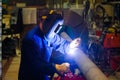 Welders working at the factory made metal Royalty Free Stock Photo