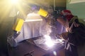 Welders working at the factory made metal Royalty Free Stock Photo