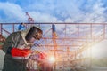 Welding in construction site on structure steel background. Royalty Free Stock Photo