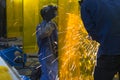 The welding craftsman grinding the steel tube Royalty Free Stock Photo