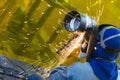 The welding craftsman grinding the steel tube