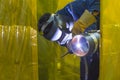 The welding craftsman welding the steel tube