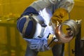 The welding craftsman welding the steel tube