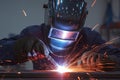 Welding expertise Professional heavy industry welder in focused action indoors Royalty Free Stock Photo