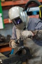 Welding man welding pipe in industry Royalty Free Stock Photo