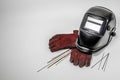 Welding mask with red gloves Royalty Free Stock Photo